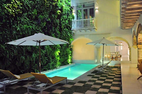 Pool - Vertical garden next to the swimming pool brings more green into your home