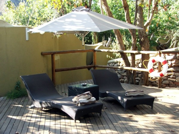 Terrace and garden sun protection ideas - use solar sails and awnings