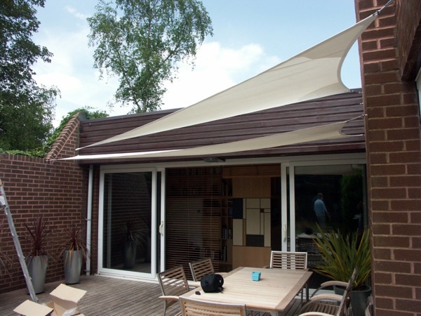 Terrace and garden sun protection ideas - use solar sails and awnings
