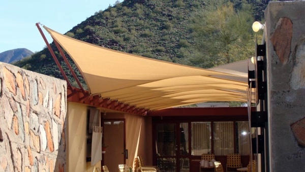 Terrace and garden sun protection ideas - use solar sails and awnings