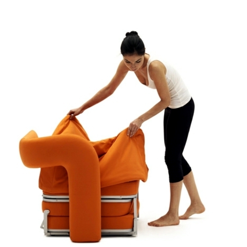 Orange armchair in single bed converted by Giulio Manzoni for Campeggi Orange armchair in single bed converted by Giulio Manzoni for Campeggi