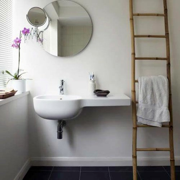 Wooden towel ladder in both rustic as well as in modern bathroom