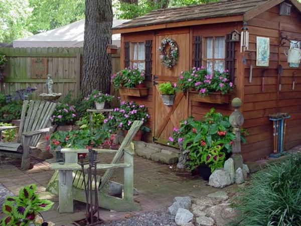 Garden houses made of wood - nice and compact garden shed in the backyard