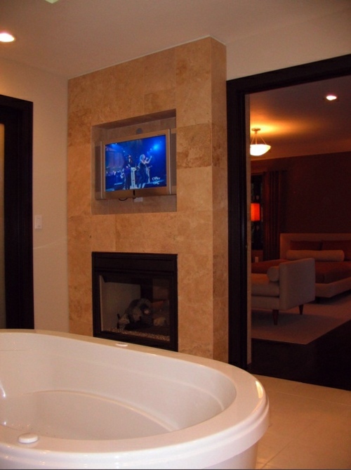 25 Bathroom designs with built-in fireplaces - romantic atmosphere