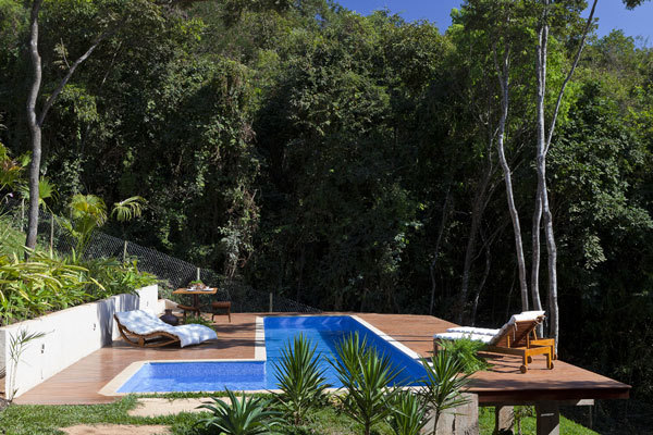 Bright youthful house in the rocky landscape in Brazil
