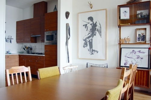 Creative decorating ideas - street finds and works of art in a house in Amsterdam
