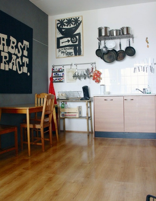 Creative decorating ideas - street finds and works of art in a house in Amsterdam
