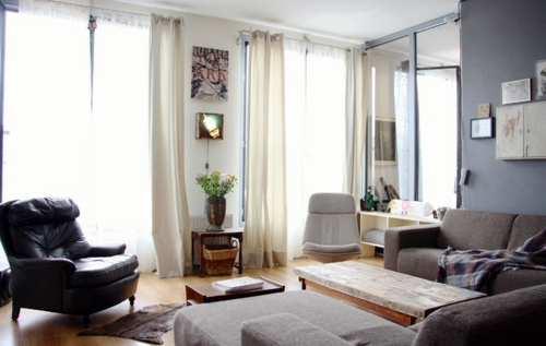 Creative decorating ideas - street finds and works of art in a house in Amsterdam