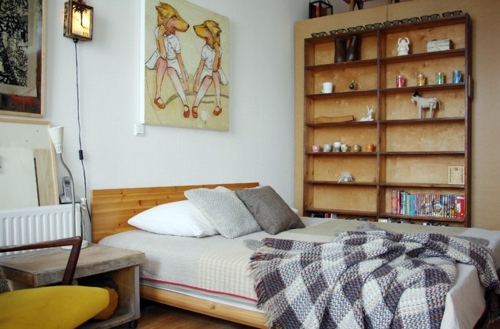 Creative decorating ideas - street finds and works of art in a house in Amsterdam