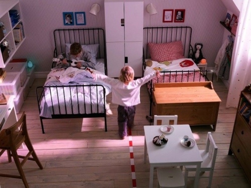 Compact and modern nursery interior for siblings