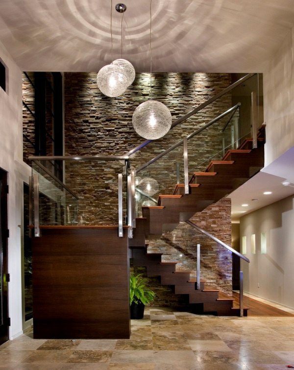 Wohnzimmereinrichtung - Receive the natural home - natural stone wall in the living room