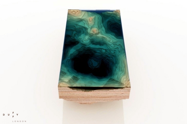 Reminds Design table in glass and wood to the depth of the ocean