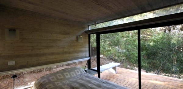 A Modern House Made of glass and wood on the coast A Modern House Made of glass and wood on the coast