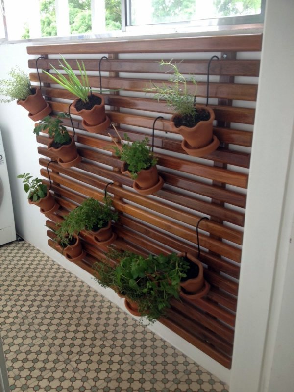 Create a vertical garden for your home by wooden panels Create a vertical garden for your home by wooden panels