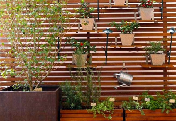 Create a vertical garden for your home by wooden panels Create a vertical garden for your home by wooden panels