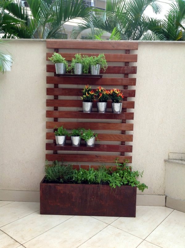 Create a vertical garden for your home by wooden panels Create a vertical garden for your home by wooden panels