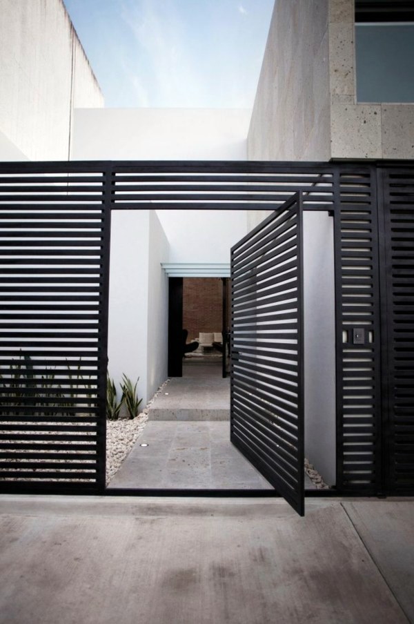 Minimalist house with an industrial touch in Canun, Mexico Minimalist house with an industrial touch in Canun, Mexico