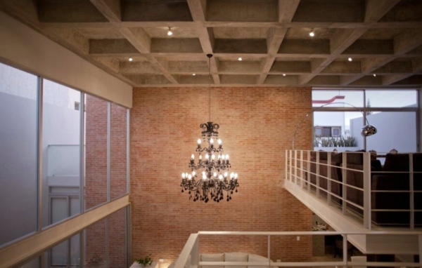Minimalist house with an industrial touch in Canun, Mexico