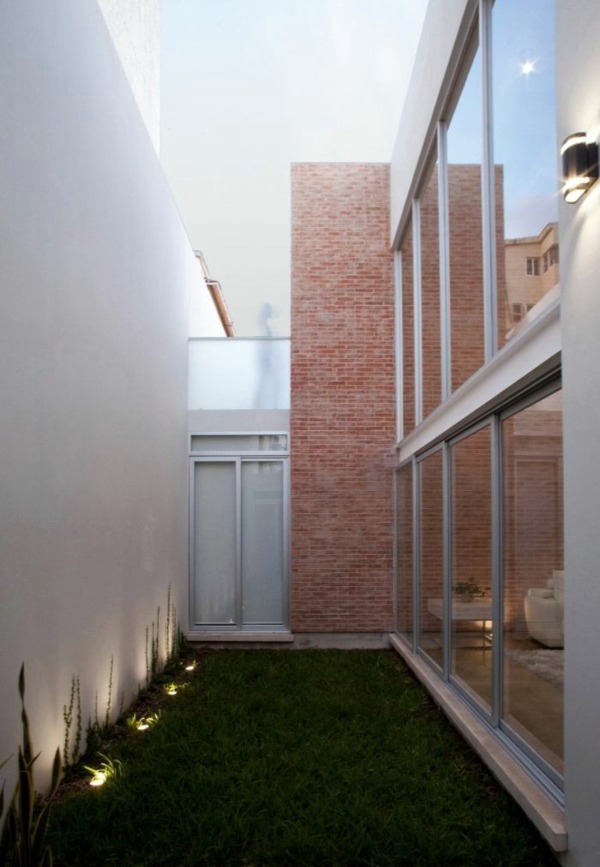 Minimalist house with an industrial touch in Canun, Mexico