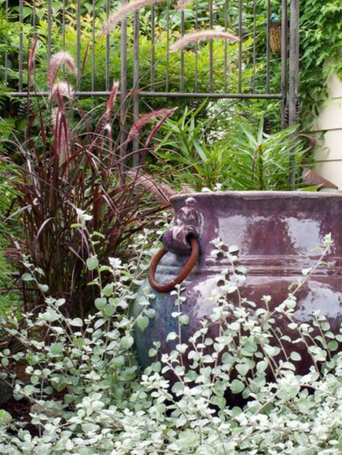 Minimalist garden design with blue gray and purple colors