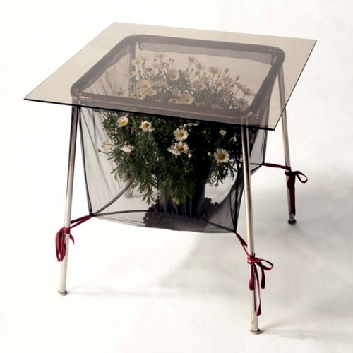 Recycled furniture used as plant containers by Peter Bottazzi and Denise Bonapace