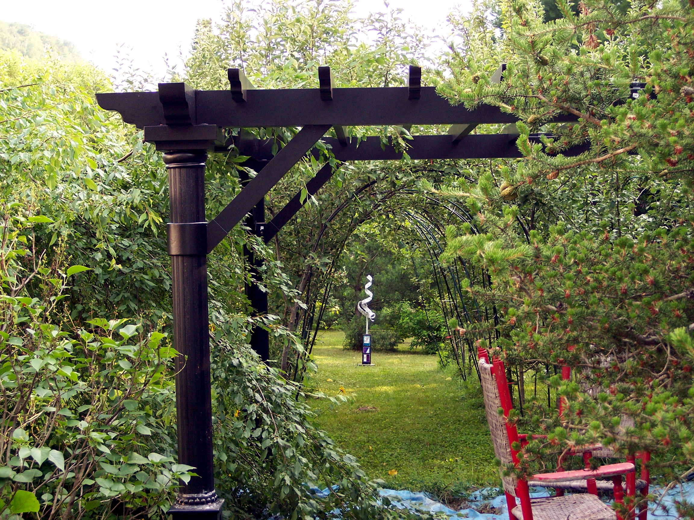 Pergola made of wood or metal for a southern flair in the garden