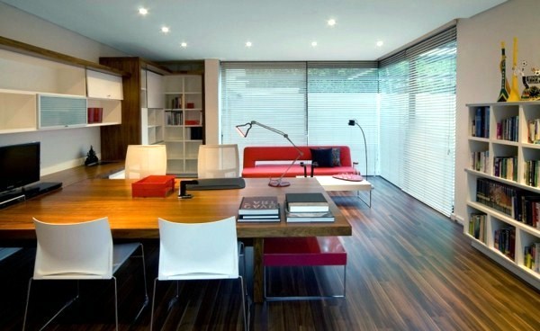 Contemporary prefab house in the Bauhaus style with glass facade and pool in the garden Contemporary prefab house in the Bauhaus style with glass facade and pool in the garden