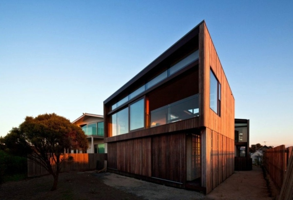 Modern residence with interior design from wood offers inviting lushness