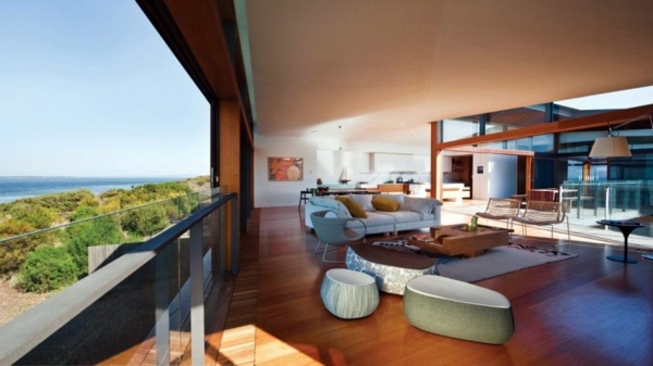 Modern residence with interior design from wood offers inviting lushness