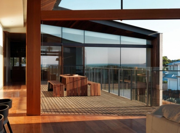 Modern residence with interior design from wood offers inviting lushness