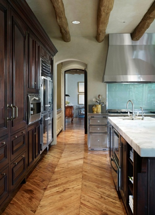 Wood flooring in the kitchen for a homely atmosphere Avso