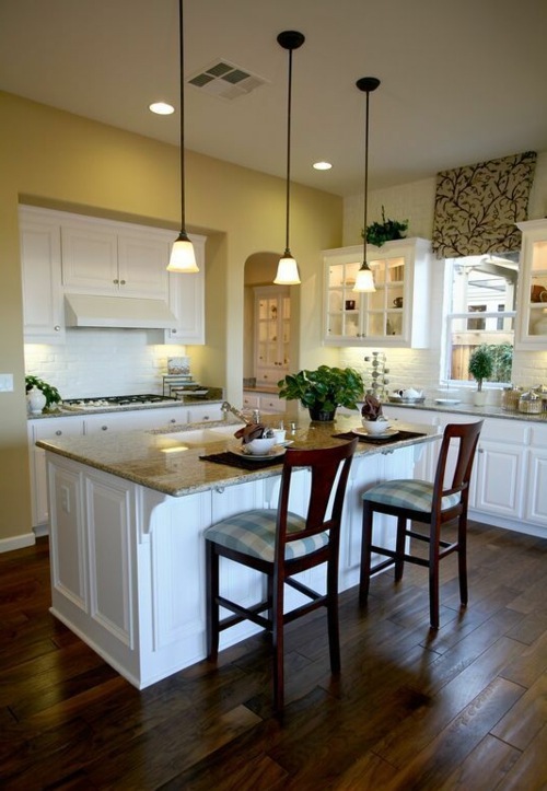 Wood flooring in the kitchen for a homely atmosphere Wood flooring in the kitchen for a homely atmosphere