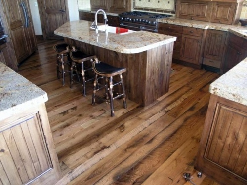 Wood flooring in the kitchen for a homely atmosphere