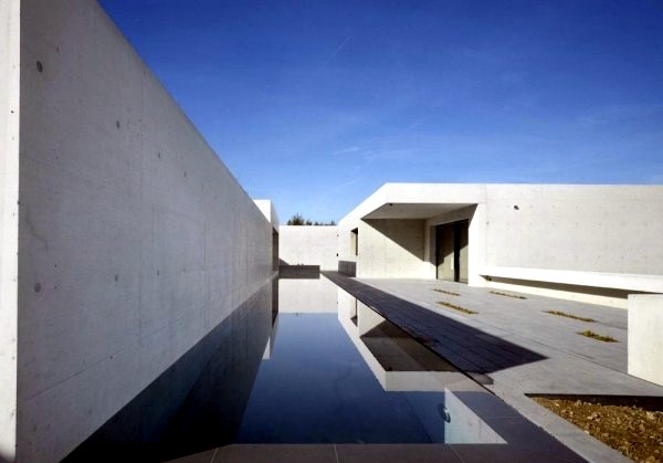 Modern House with Minimalist Design on a slope - Villa K