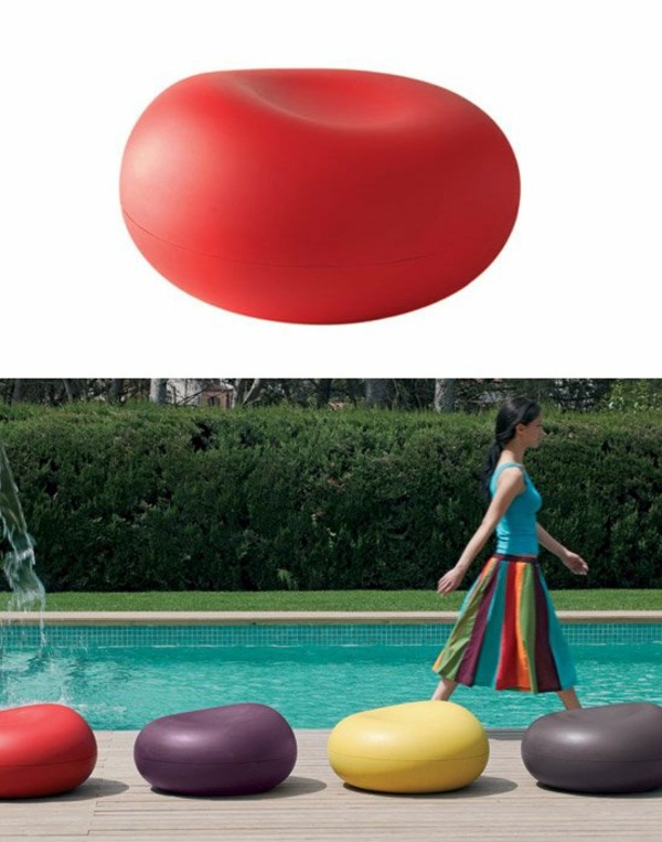 Bright red seat cushions for strange living room or great pool design
