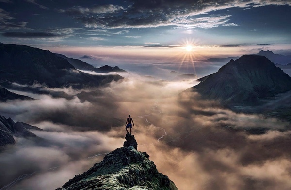 Small people, lost in the majesty of nature