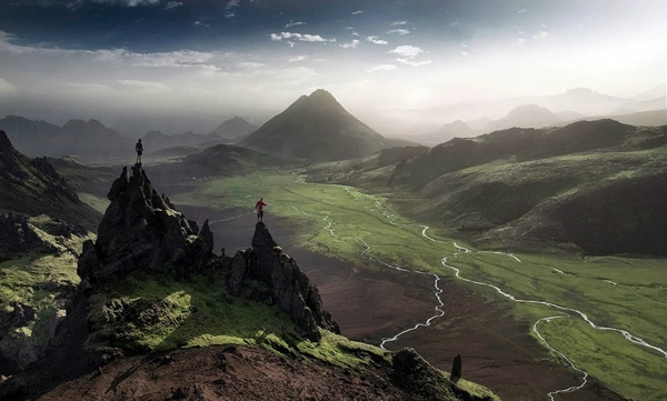 Small people, lost in the majesty of nature