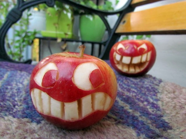 Decorative fruit carving - apple art and expressive faces