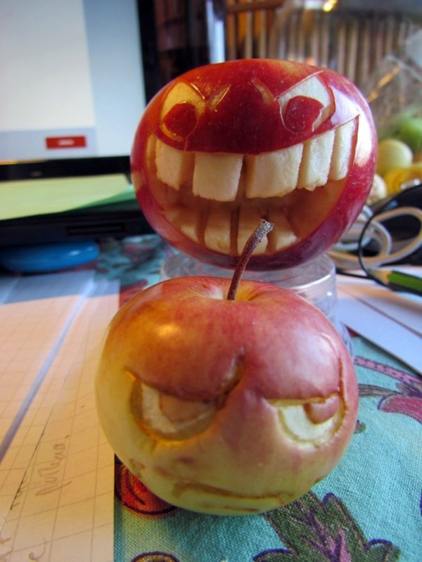 Decorative fruit carving - apple art and expressive faces
