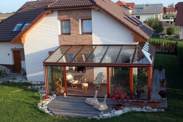 Balcony or terrace glass conservatory - Build on a beautiful winter garden Balcony or terrace glass conservatory - Build on a beautiful winter garden