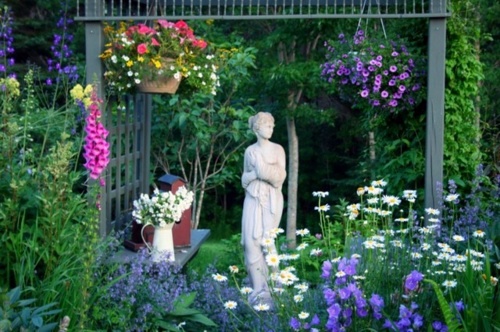 You have a penchant for hanging plants? - Hanging flower pots on the porch
