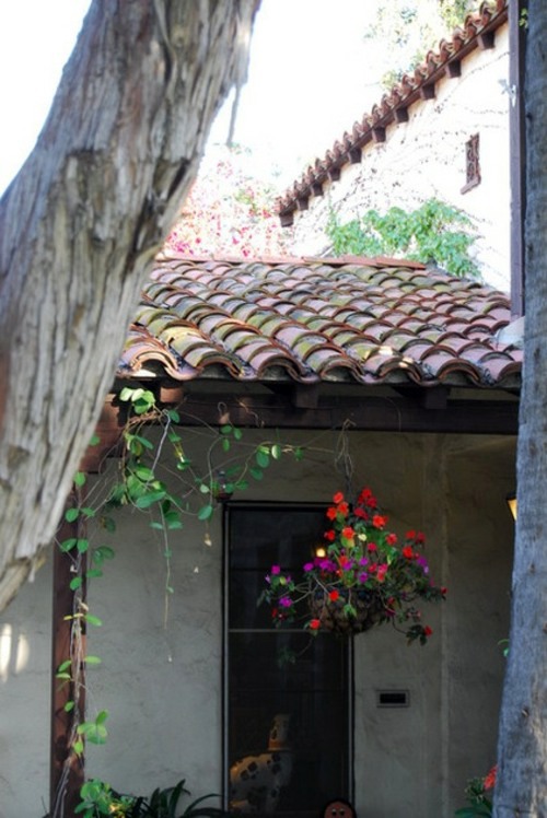 You have a penchant for hanging plants? - Hanging flower pots on the porch You have a penchant for hanging plants? - Hanging flower pots on the porch