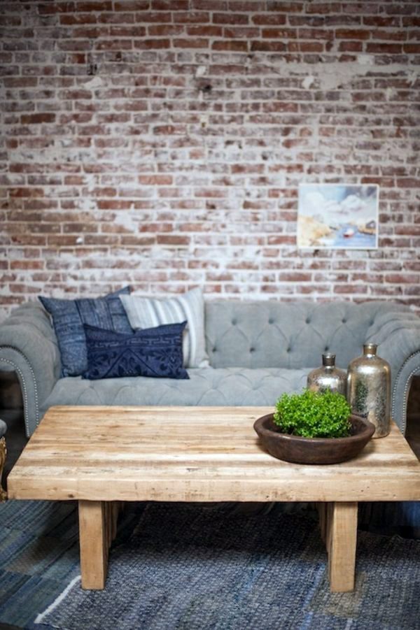 A wooden coffee table in the living room adds warmth and naturalness in A wooden coffee table in the living room adds warmth and naturalness in