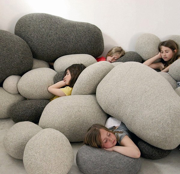 Designer cushion in the form of stones - stylish and practical