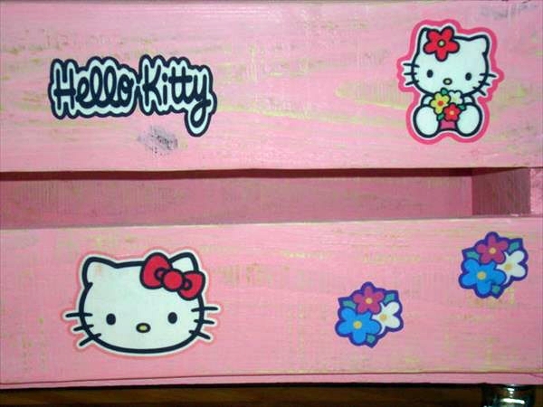 Pink storage box on wheels made of wood pallets Pink storage box on wheels made of wood pallets