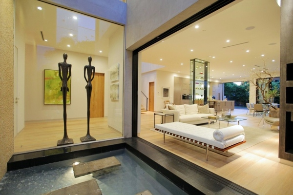 Modern luxury house with water features and modern design