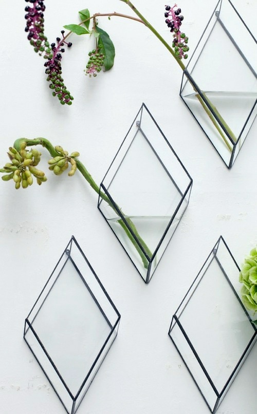 Designer furniture idea - vase on the wall. Can you imagine that?