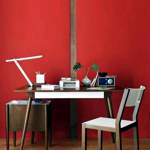 Showy, funktonal furnished home office with red accents