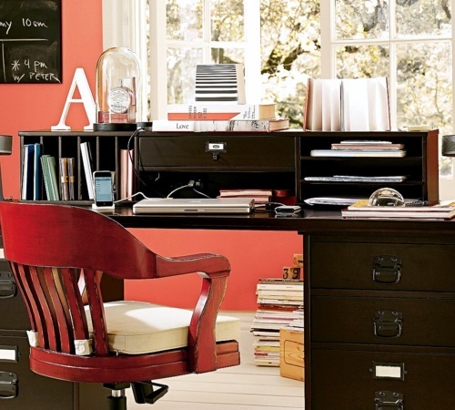 Showy, funktonal furnished home office with red accents