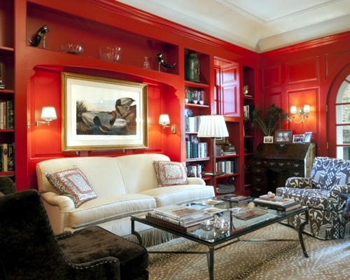 Showy, funktonal furnished home office with red accents